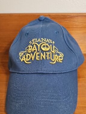 Disney Tianas Bayou Adventure Embroidered Navy Baseball Cap - Yellow Logo